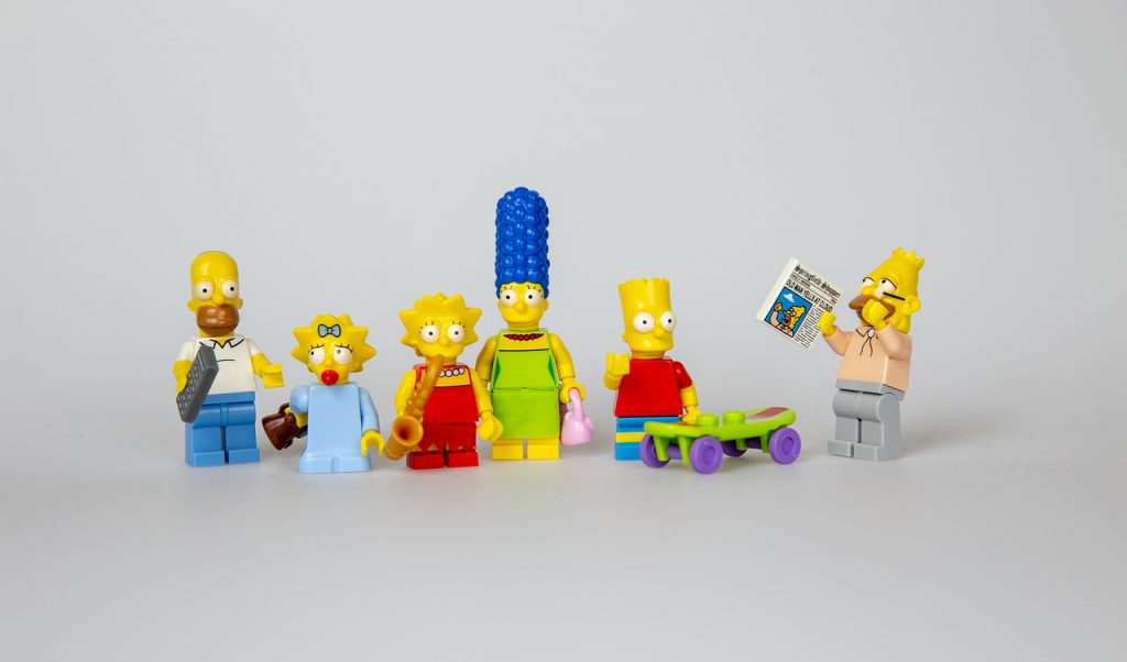 Simpsons als Lego-Figuren. Die Kommunikationswissenschaft wird oft als brotlos und zukunftsarm gesehen. Eigentlich paradox, wo Medien zur Tagesordnung gehören.
